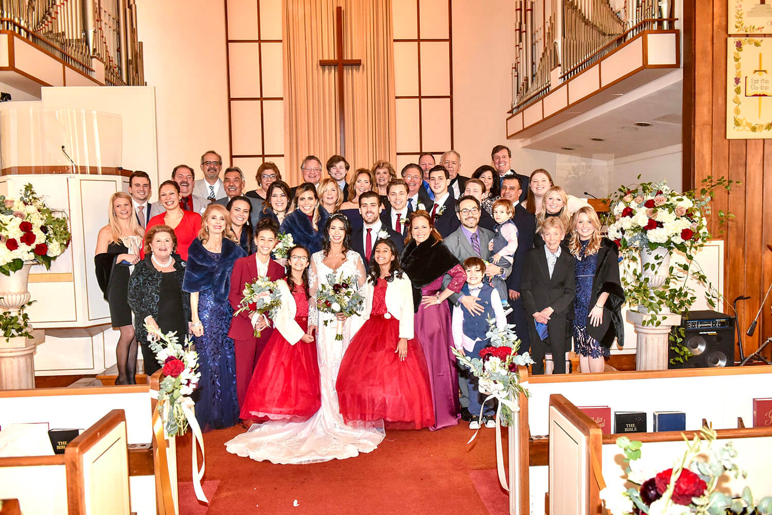 family wedding picture in sanctuary